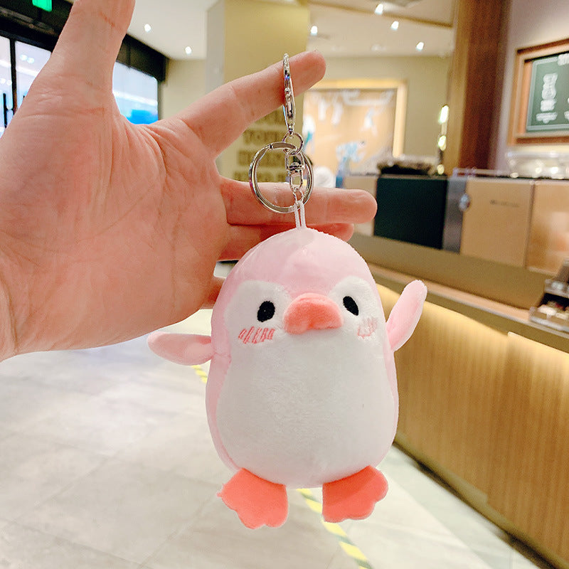 Cute Penguin plush keychain — pink penguin with metal keyring, handheld scale